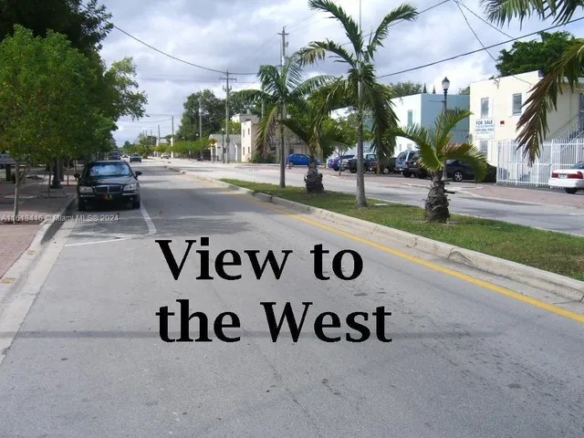 a view of a balcony with furniture