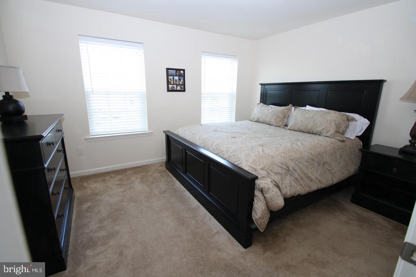 3753 Jacob Stout Road, Unit 12 Doylestown, PA 18902 - Photo 5 of 13 Cozy bedroom with natural light.
