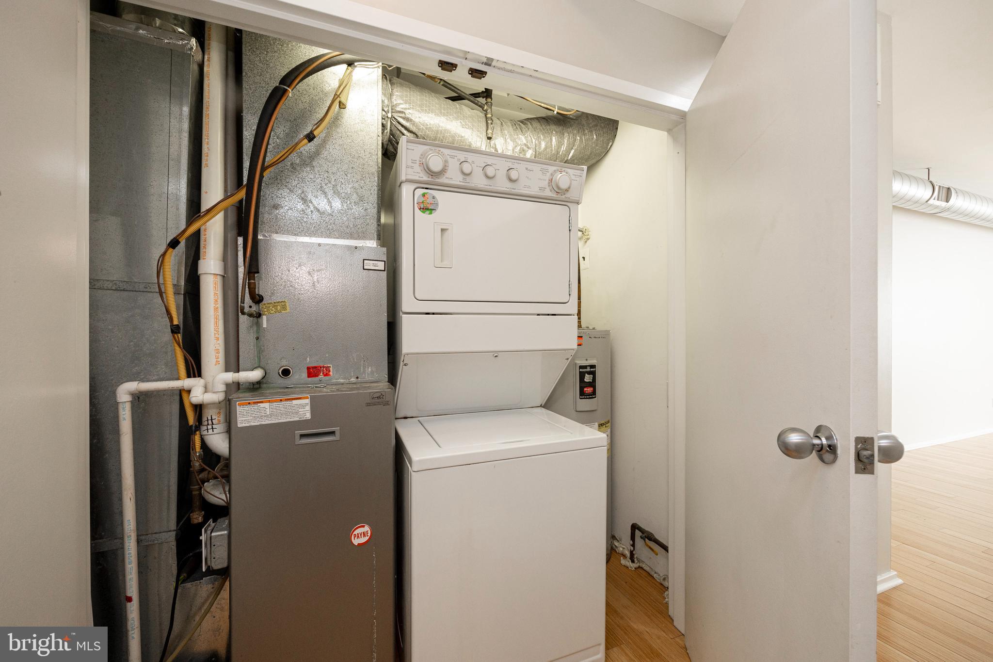 182 Gay Street, Unit 502 Philadelphia, PA 19128 - Photo 15 of 21 a utility room with dryer and washer