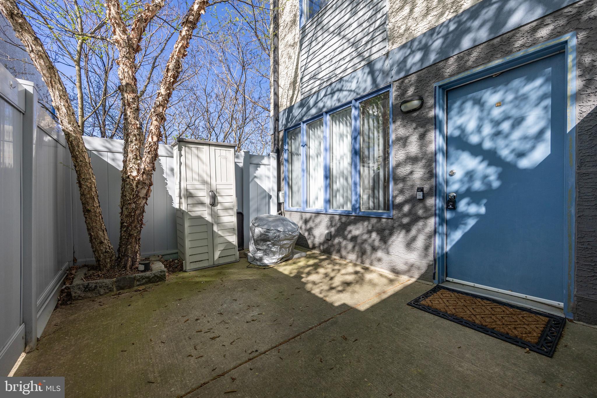182 Gay Street, Unit 502 Philadelphia, PA 19128 - Photo 16 of 21 a view of a yard with wooden fence
