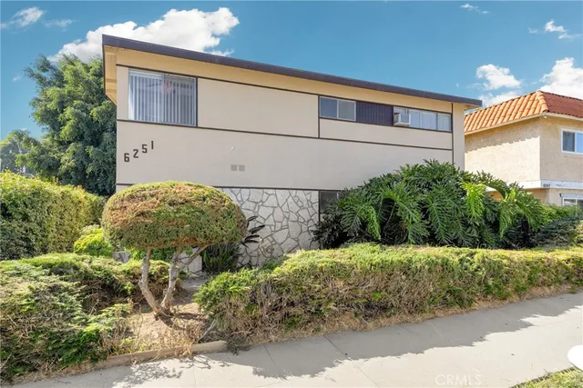 a view of a backyard of the house