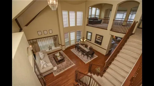 a view of living room with furniture and fireplace