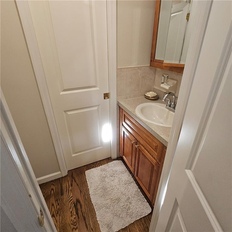 1012 41st Street, Unit 4 Brooklyn, NY 11219 - Photo 12 of 12 a bathroom with a sink a washer and dryer