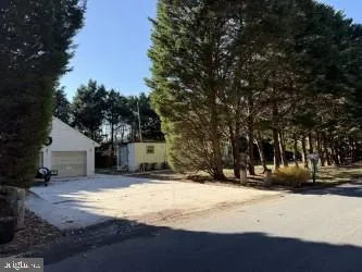 a view of large house with a yard