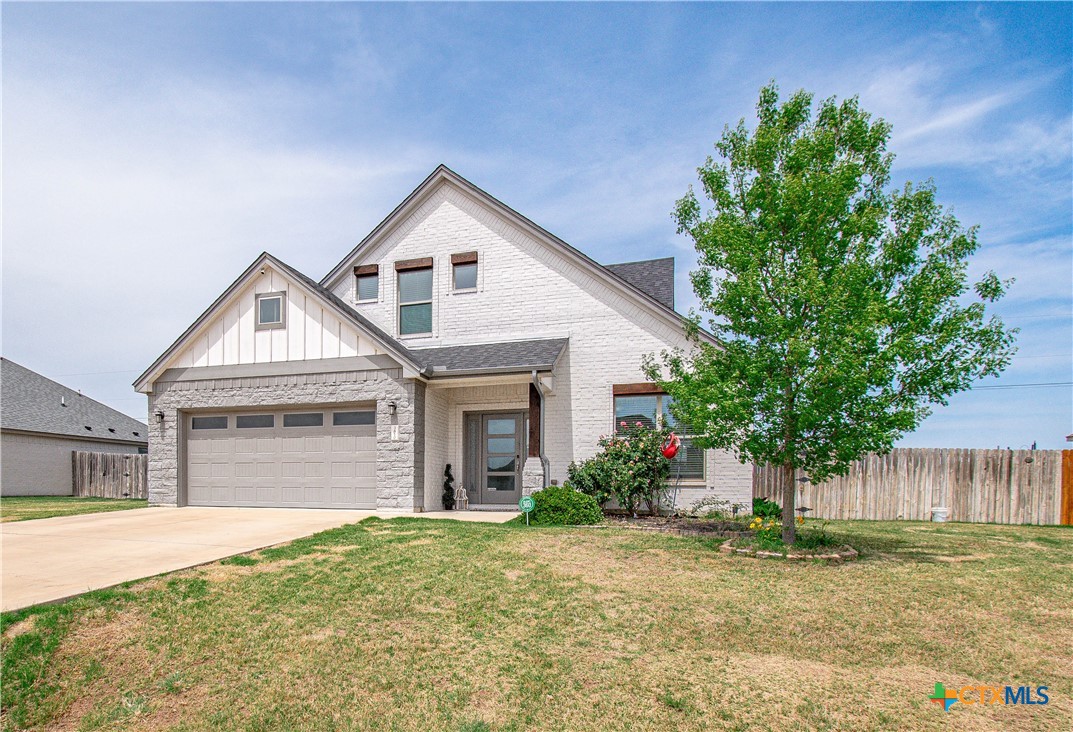3810 Twilight Drive Temple, TX 76502 - Photo 1 of 29 a front view of a house with a yard and garage