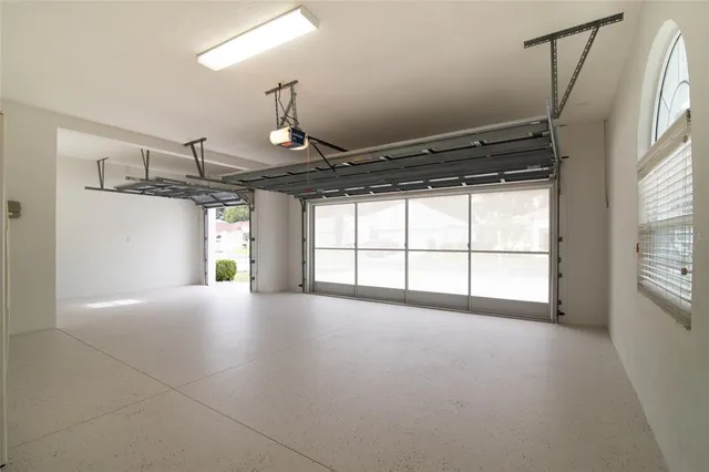 a view of a swimming pool with a yard