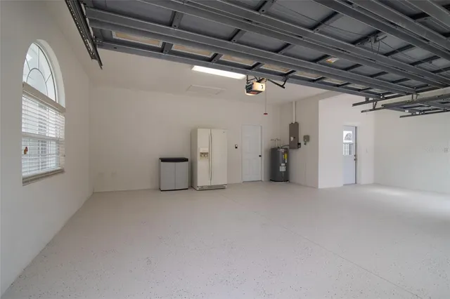 a view of a house with swimming pool and porch