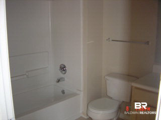 1517 West Regency Road, Unit 91 Gulf Shores, AL 36542 - Photo 8 of 8 2 and 1/2 baths.... one off of each bedroom and 1/2 bath combined with laundry area on the first floor.