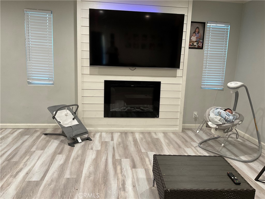 114 South Acacia Avenue Rialto, CA 92376 - Photo 6 of 27 Family Room Fireplace