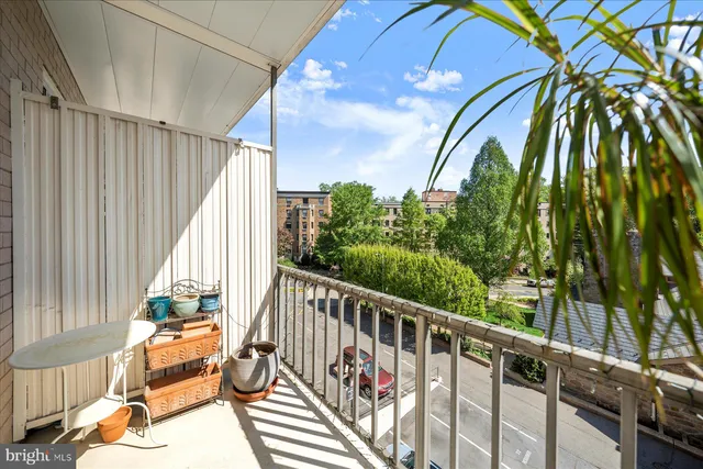 a view of balcony with furniture