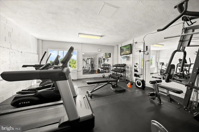 a view of a room with gym equipment