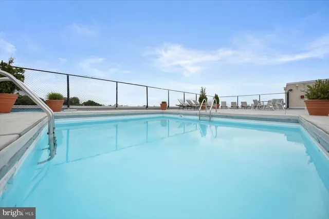 a view of a balcony with chairs