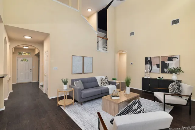 a living room with furniture and a couch