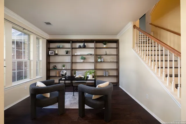 a view of a livingroom with furniture