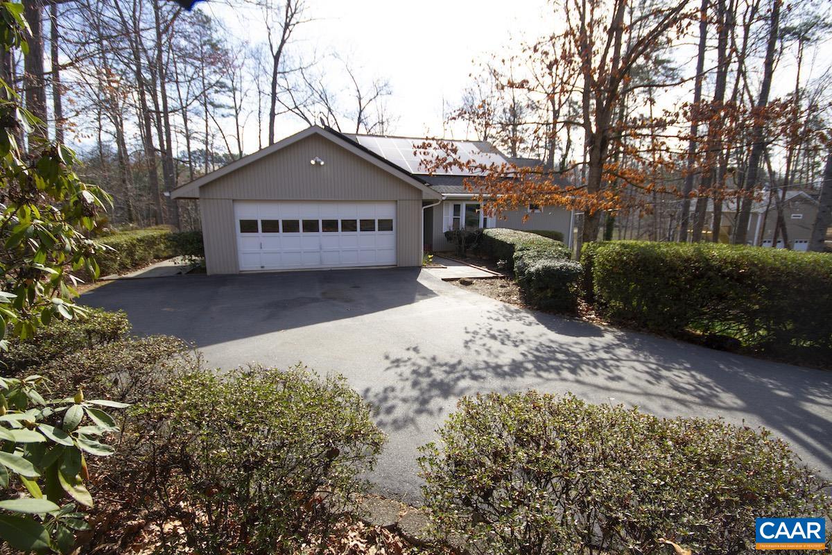 357 Logtrac Road Stanardsville, VA 22973 - Photo 3 of 36 a house with trees in front of it