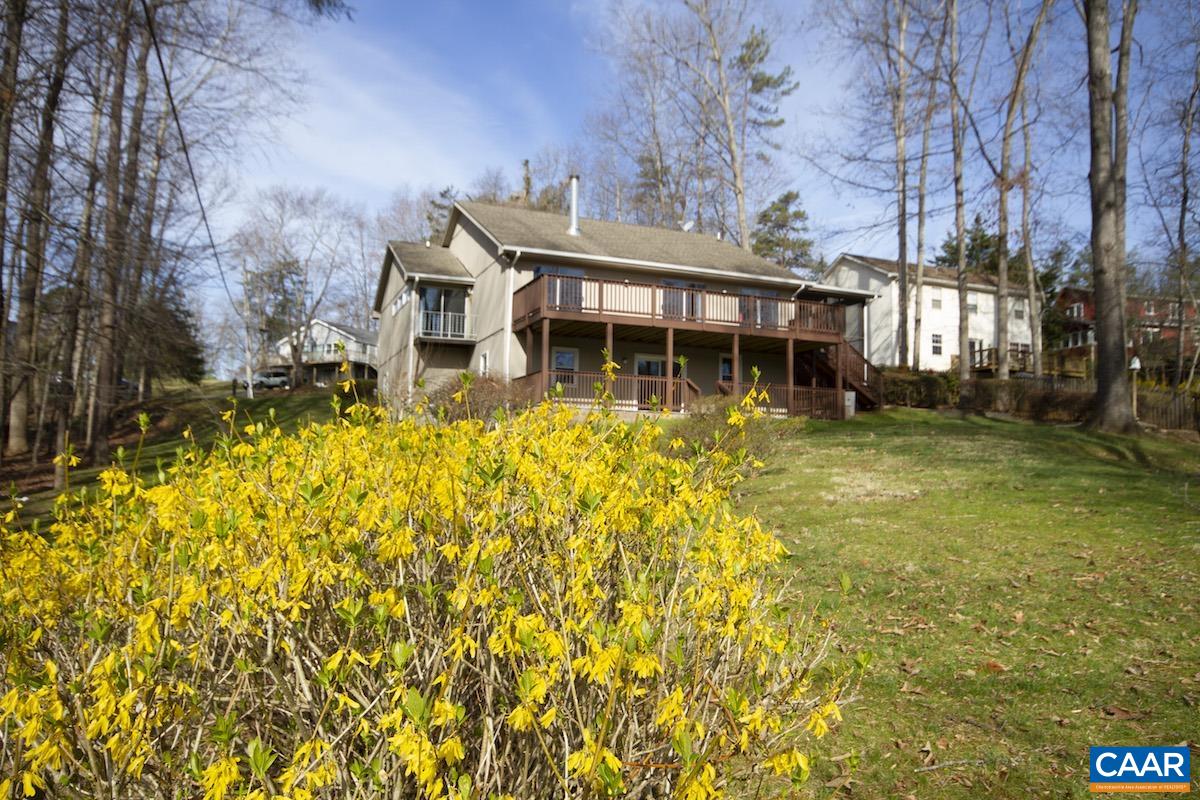 357 Logtrac Road Stanardsville, VA 22973 - Photo 35 of 36 a view of a house with a large pool and sitting area