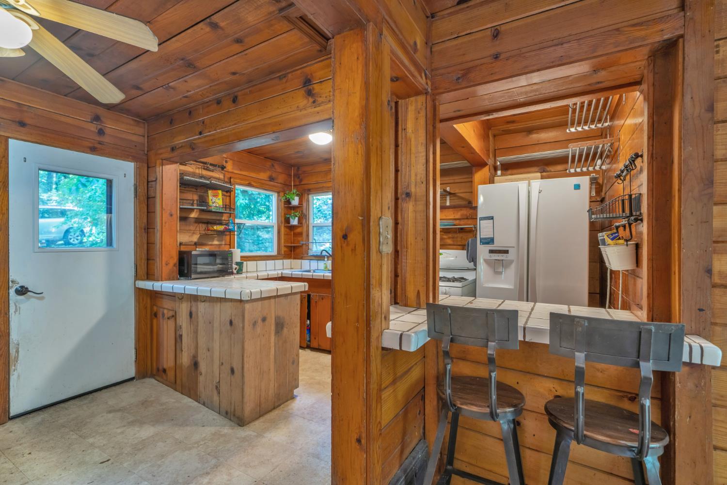 6929 Split Bend Road Pollock Pines, CA 95726 - Photo 9 of 38 a bathroom with a granite countertop sink and a mirror