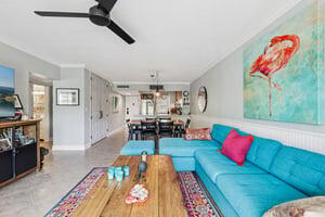 200 East Royal Palm Road, Unit 3030 Boca Raton, FL 33432 - Photo 12 of 30 a living room with furniture and wooden floor