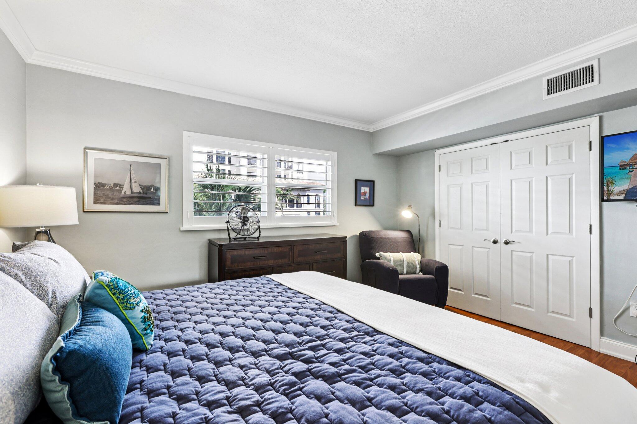 200 East Royal Palm Road, Unit 3030 Boca Raton, FL 33432 - Photo 13 of 30 a bedroom with a bed and window