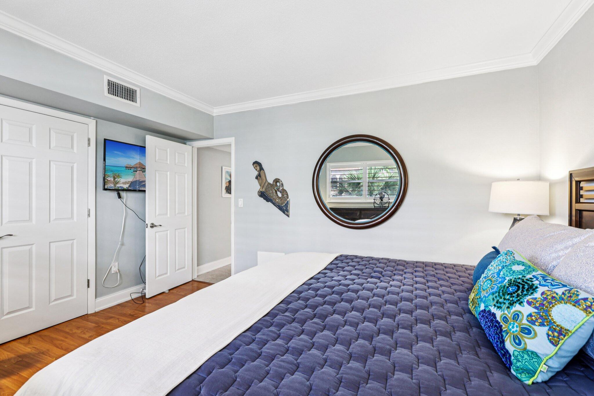 200 East Royal Palm Road, Unit 3030 Boca Raton, FL 33432 - Photo 16 of 30 a bedroom with a bed and a window