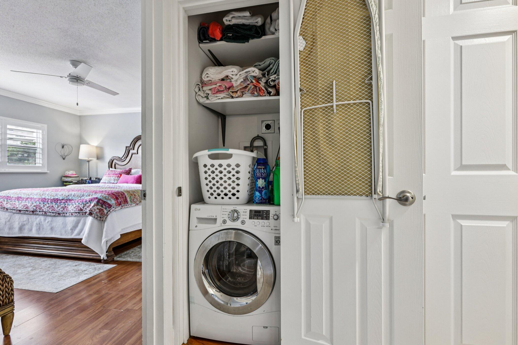 200 East Royal Palm Road, Unit 3030 Boca Raton, FL 33432 - Photo 26 of 30 a bed room with a bed and a couch