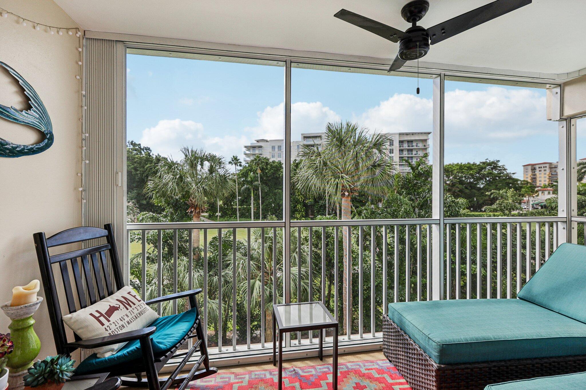 200 East Royal Palm Road, Unit 3030 Boca Raton, FL 33432 - Photo 28 of 30 a view of a balcony with chair and wooden floor