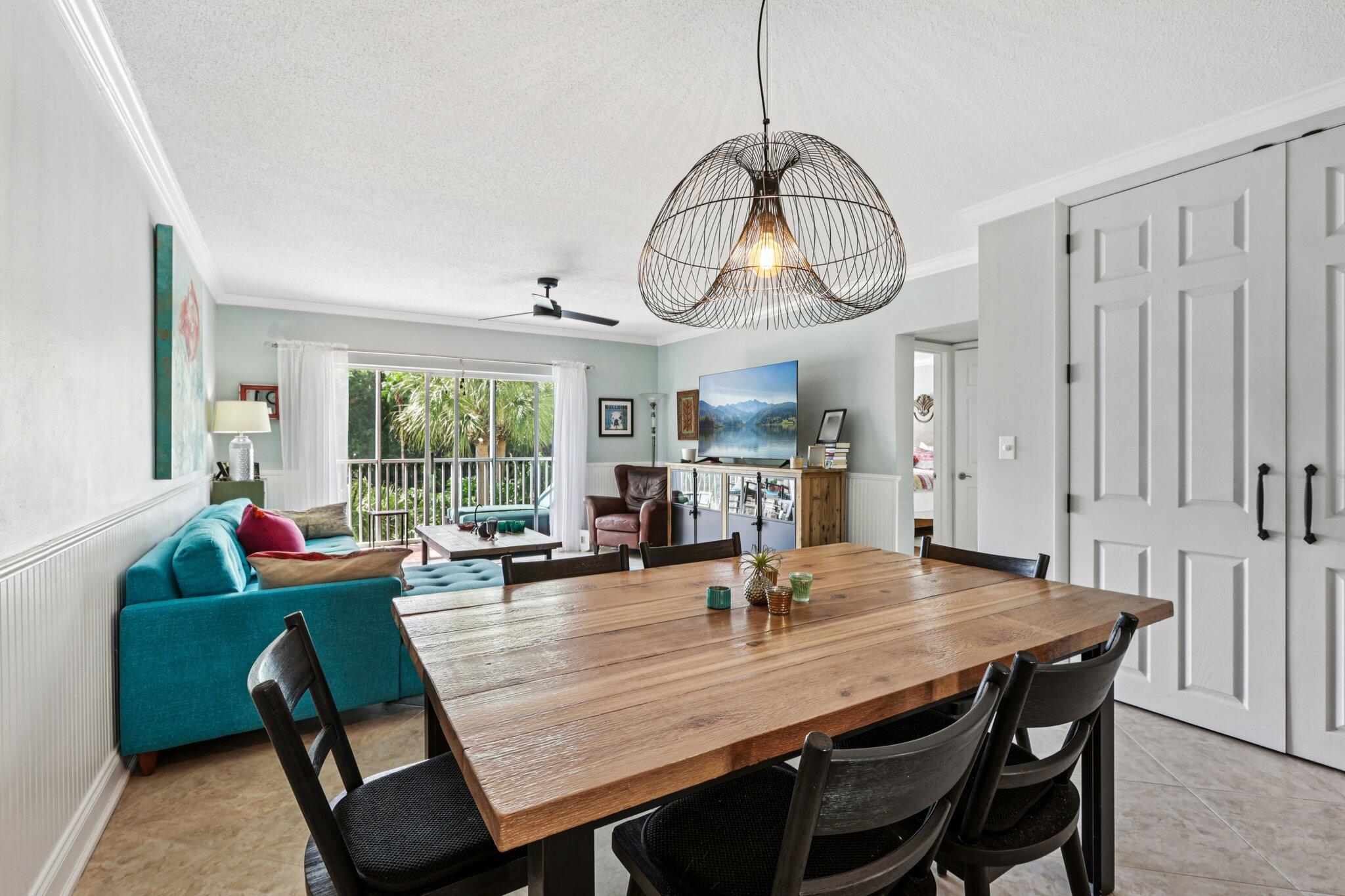 200 East Royal Palm Road, Unit 3030 Boca Raton, FL 33432 - Photo 8 of 30 a view of a dining room with furniture window and wooden floor