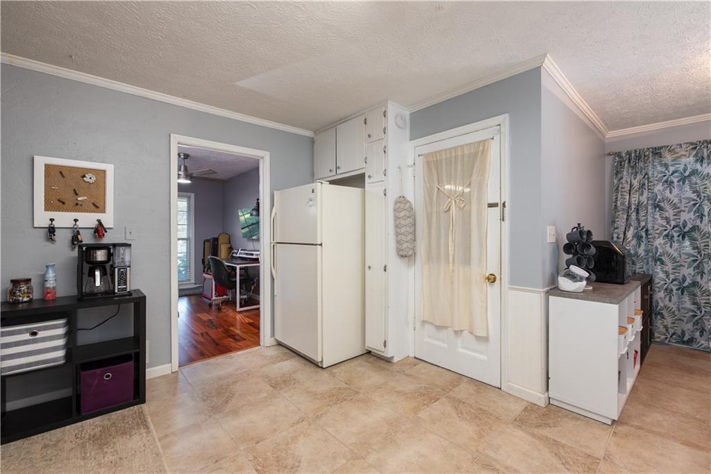 2598 Mountain View Road Snellville, GA 30078 - Photo 13 of 33 a view of a livingroom with a kitchen