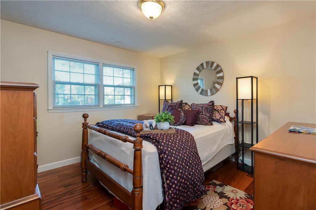 2598 Mountain View Road Snellville, GA 30078 - Photo 18 of 33 a bedroom with a bed and a window