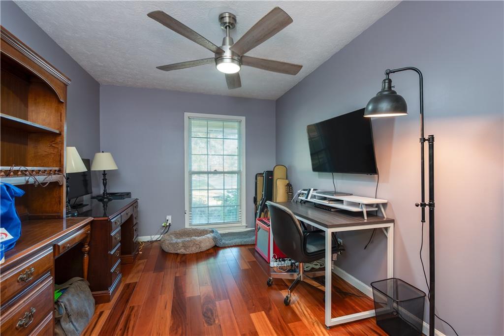 2598 Mountain View Road Snellville, GA 30078 - Photo 20 of 33 a view of a workspace with furniture and a window
