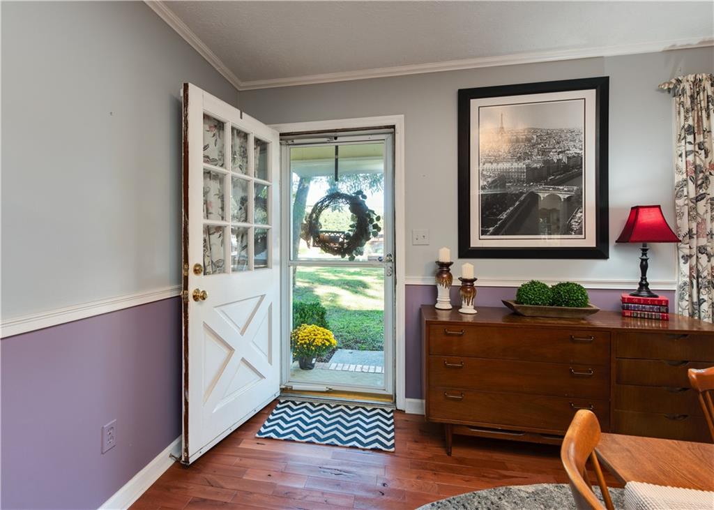 2598 Mountain View Road Snellville, GA 30078 - Photo 3 of 33 a room that has a couch and a potted plant