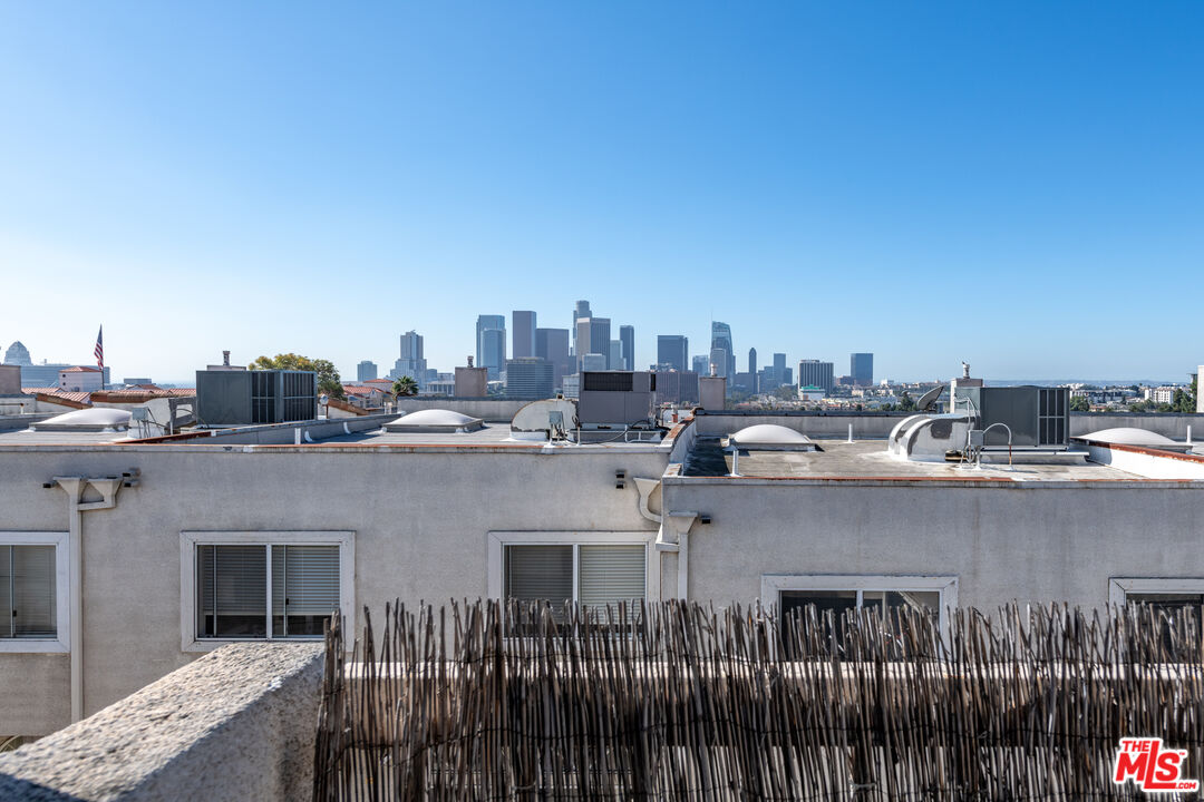 1001 Figueroa Terrace, Unit 305 Los Angeles, CA 90012 - Photo 11 of 18 a view of a city with tall buildings