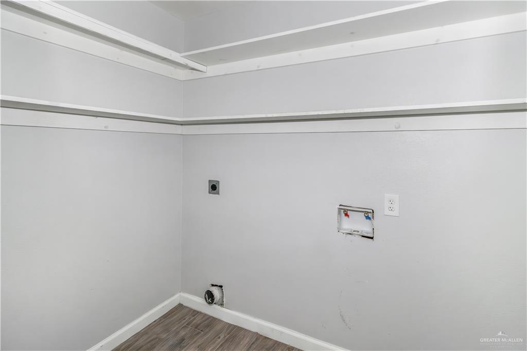 4117 South Las Nubes Street Pharr, TX 78577 - Photo 14 of 18 a view of a room with racks on the wall