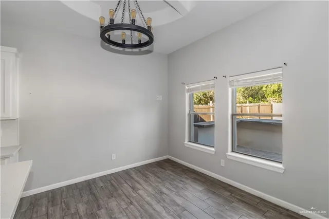 a view of an empty room with window