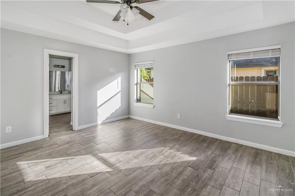 4117 South Las Nubes Street Pharr, TX 78577 - Photo 8 of 18 a view of an empty room with a window