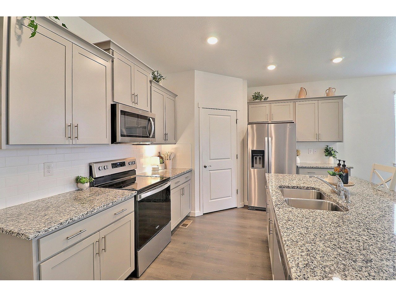 1269 Wild Basin Road Severance, CO 80550 - Photo 10 of 45 Stainless appliances, walk in pantry
