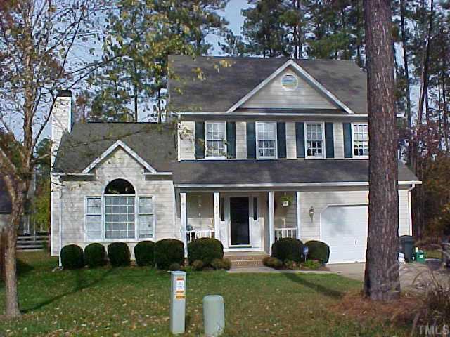 12328 Inglehurst Drive Raleigh, NC 27613 - Photo 1 of 1 a front view of a house with garden
