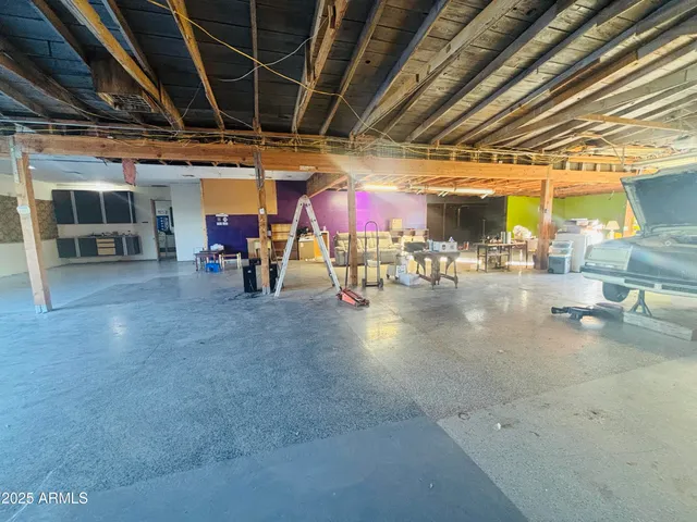 a view of a studio with wooden floor