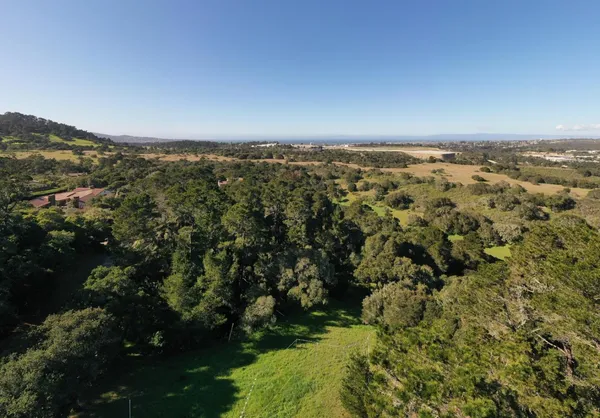a view of a houses with a lake view