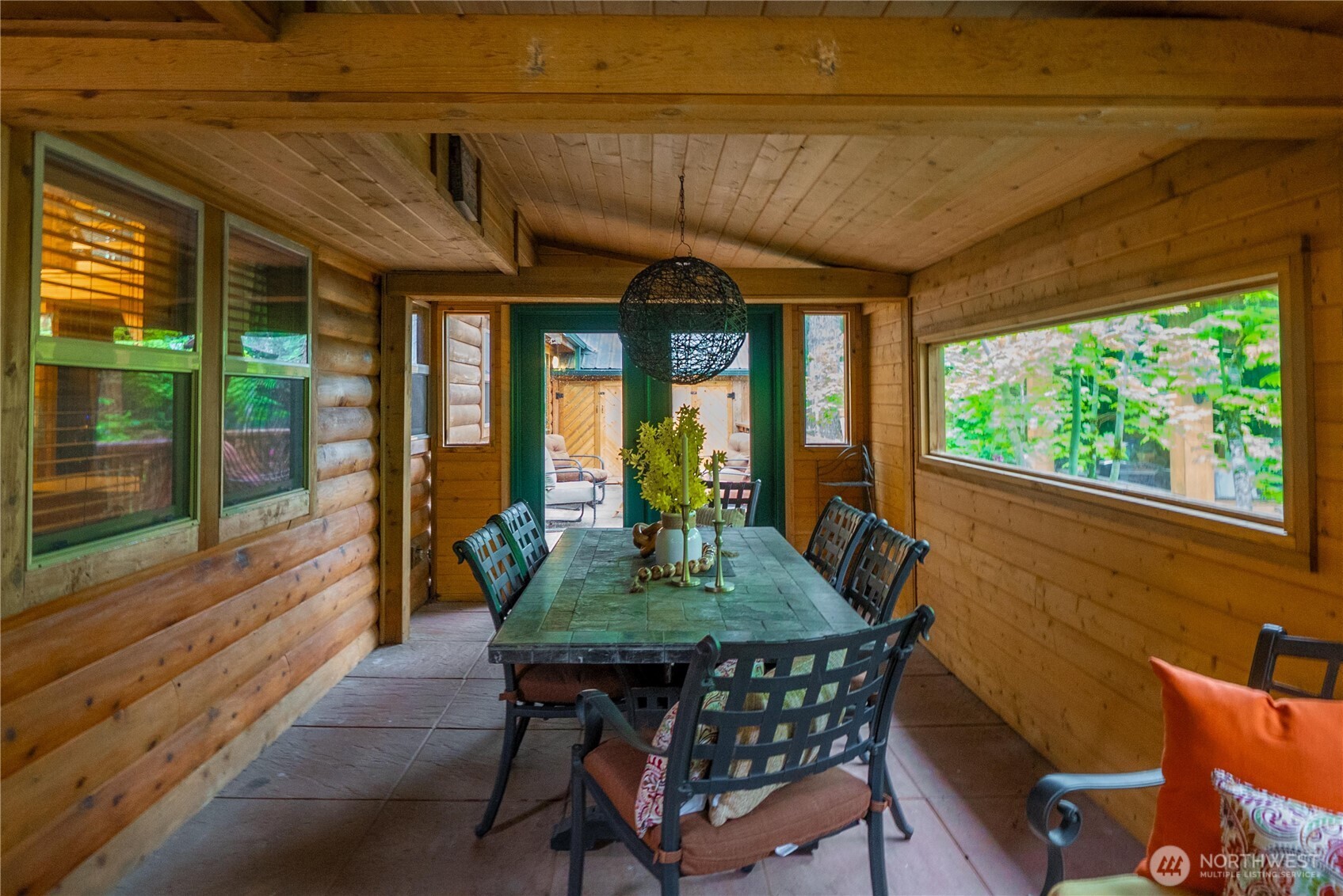1546 Reservation Road Southeast, Unit 149 Olympia, WA 98513 - Photo 21 of 38 a view of a patio with a table chairs and a potted plant