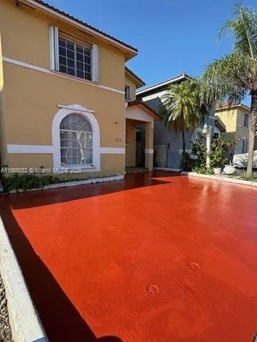 a front view of house with yard and outdoor seating