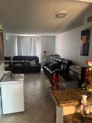 a kitchen with a sink and a stove top oven