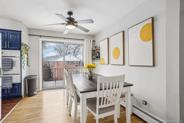 a dining room with furniture and window