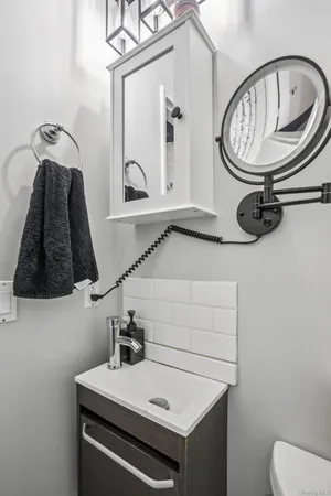 a bathroom with a sink and a toilet