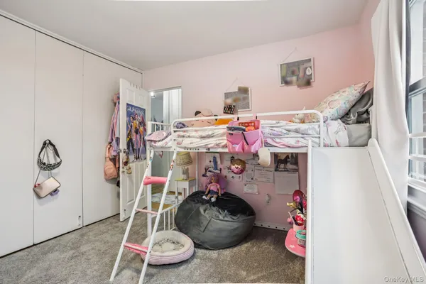 a room with furniture and musical instruments