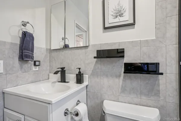 a view of a balcony with wooden fence