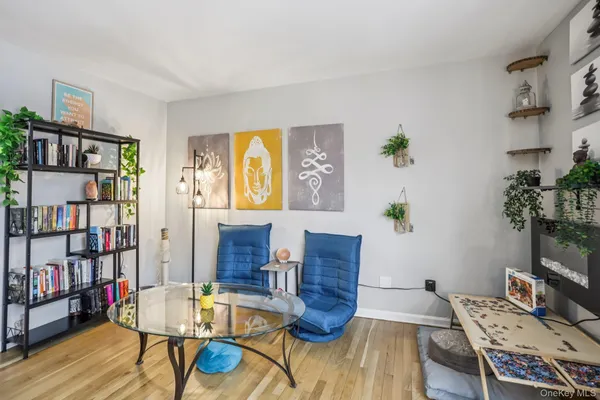 a workspace with furniture and book shelf