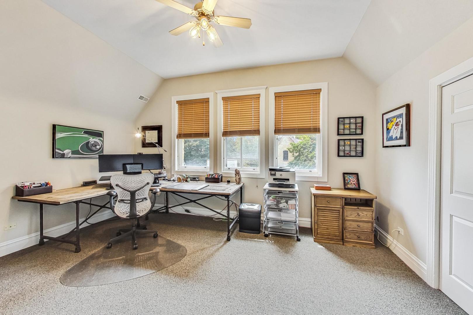 50 MacArthur Loop Highland Park, IL 60035 - Photo 26 of 44 a living room with furniture and a large window