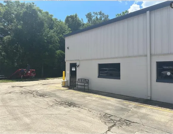 a view of a backyard of a house