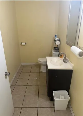 a bathroom with a sink and a toilet
